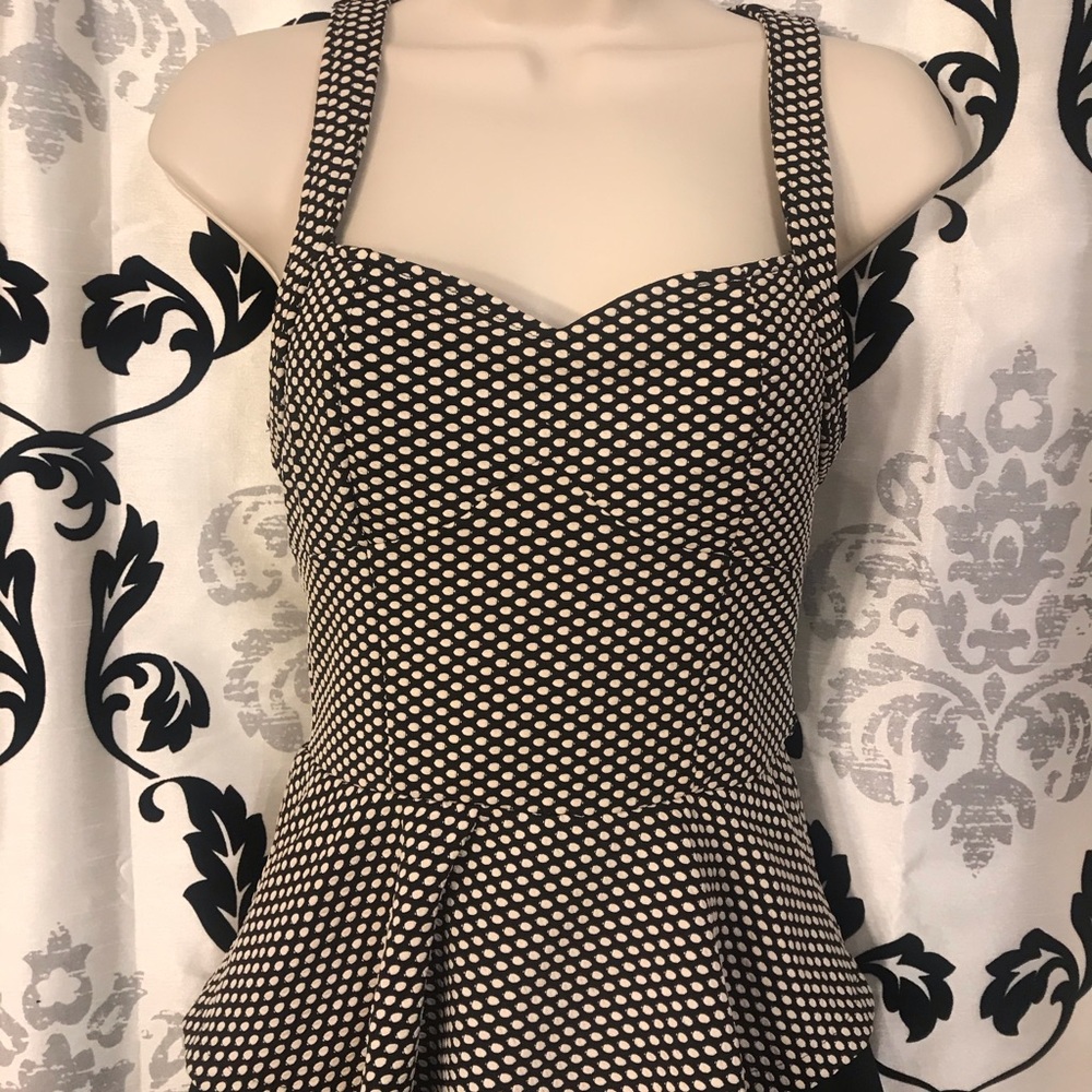 Black and white peplum top